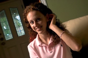 ###Rare Redhead: Danielle Clark, 23, Ocala### Redheaded Danielle Clark, 23, at her home in Ocala. She noted that many people remember her because of her long, curly red hair. Clark is a student at the University of Florida, majoring in recreation event management and also works full time at her family's business Clark Properties, Saturday afternoon, April 9, 2005, Ocala, FL, USA. (Jannet Walsh/Star-Banner)2005