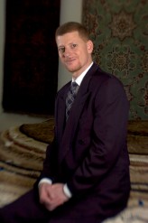 ###Rare Redhead: Jamal Fakhoury, 48, Ocala### Redheaded Dr. Jamal Fakhoury, 48, of Ocala, is a chiropractor by profession. He is originally from the Detroit, Michigan area, but spent part of life growing up in the Middle East. A Muslim by faith, has heritage links to Lebanon from his mother and from Palestine on his father side. Fakhoury has a younger brother Omar Fakhoury, of Ocala, with red hair, including his father, both grandfathers, a grandmother and even a daughter with a signs of auburn red hair. Fakhoury is surrounded by Persian rugs at the Cyrus Rug Gallery, in Ocala, Saturday afternoon, April 9, 2005, Ocala, FL, USA. (Jannet Walsh/Star-Banner)2005