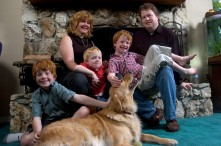 ###Rare Redhead: Michael and LuAnne Warren family of five redheads and red haired dog, Ocala### Redheaded parents LuAnne Warren, 42, and Michael Warren, 36, do their best to sit with their three active red haired boys. Matthew Warren, 8, left, Jonathan, 3, center, and Paul Warren, 6, all have fun with Jenny the Golden Retriever, also a redhead, Monday evening, April 11, 2005, Ocala, FL, USA. (Jannet Walsh/Star-Banner)2005