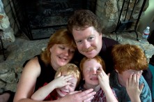 ###Rare Redhead: Michael and LuAnne Warren family of five redheads and red haired dog, Ocala### Redheaded parents LuAnne Warren, 42, and Michael Warren, 36, do their best to sit with their three active red haired boys. Jonathan Warren, 3, left, Paul Warren, 6, center, and Matthew Warren, 8, all have fun with Jenny the Golden Retriever, also a redhead, Monday evening, April 11, 2005, Ocala, FL, USA. (Jannet Walsh/Star-Banner)2005