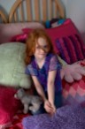 ###Rare Redhead: Riley Grace Mixson, 5, Ocala### Redheaded Riley Grace Mixon, 5, of Ocala, lounges in her bedroom with a few of her favorite pillows and stuffed animals. She is the daughter of Susan and Rick Mixson, Friday afternoon, April 15, 2005, Ocala, FL, USA. (Jannet Walsh/Star-Banner)2005