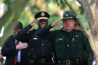 ###Law Enforcement Memorial Day Ceremony##Retired Ocala Police Chief Morrey Deen, left, Ocala Police Chief Samuel Williams, center, and Marion County Sheriff Ed Dean, salute and give their respect to the fallen law enforcement during the present the memorial wreath during the Law Enforcement Memorial Day Ceremony at the Marion County Court House, the Friday morning, May 27, 2005, Ocala, FL, USA. (Jannet Walsh/Star-Banner)2005