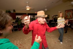 ###Ocala Star-Banner, Seniors Valentine's Ball at Hampton Manor, Belleview, FL - contact photographer at 352-598-7976### Lloyd Baldini(cq) age 79, right, resident, dances with his daughter Kathy Stafford(cq), of The Villages, at the Valentine's Ball complete with music and rose petals on the dance floor at Hampton Manor, Tuesday evening, Feb. 14, 2006, Belleview, FL. ( Jannet Walsh/Star-Banner)2006
