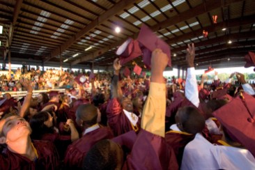 ###Ocala Star-Banner - North Marion High School graduation at the Southeastern Livestock Pavilion, Ocala, Ocala FL - Contact photographer at 352-598-7976. Photo Editor Alan Youngblood, 352-598-7967### Students celebrate with diplomas in hand at the North Marion High School graduation at the Southeastern Livestock Pavilion, Ocala, Thursday evening, May 18, 2006, Ocala, FL. ( Photo by Jannet Walsh/Star-Banner)2006