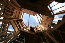 ###NEWS - Golden Ocala construction - Ocala - CONTACT PHOTOGRAPHER 352-598-7976 - cell### Andres Segura (cq) center, with New Phase Construction, an Ocala framing business, works on the 29 foot stair tower. The home is being built for Derrick Kelly (cq) , by Luetgert Development, general contractor, with 5,737 square feet living under air conditioning and 7,950 square feet total living, Tuesday morning, June 21, 2005, in Ocala, FL. (Jannet Walsh/Star-Banner)2005